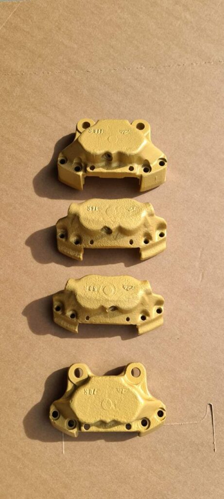 Cerakote brake calipers in Gold V-167, caliper coating by Slamfire Tactical Coatings near Wellingborough, Northamptonshire