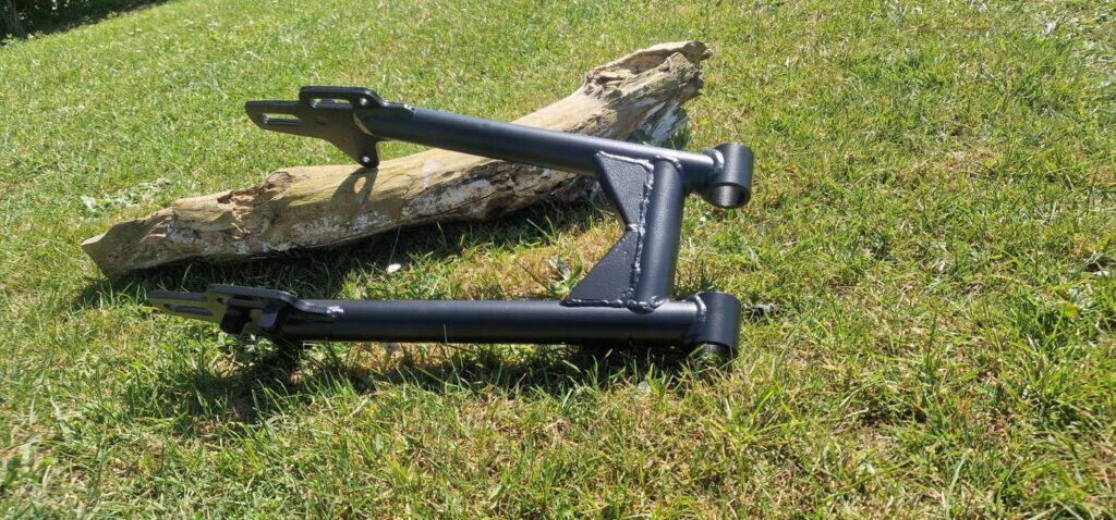 Motorcycle swing arm Cerakoted in Graphite Black H-146 by Slamfire Tactical Coatings near Wellingborough